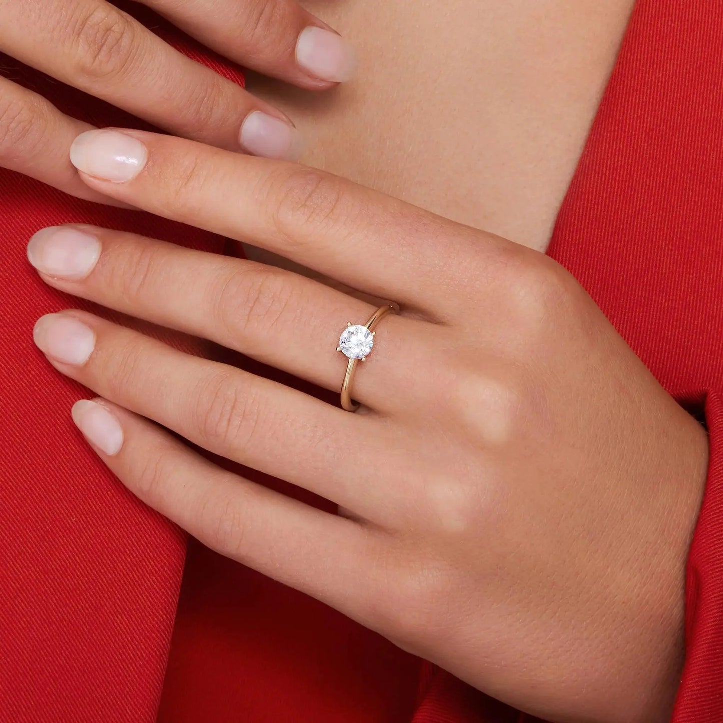 Four Prong Round Cut Moissanite Ring