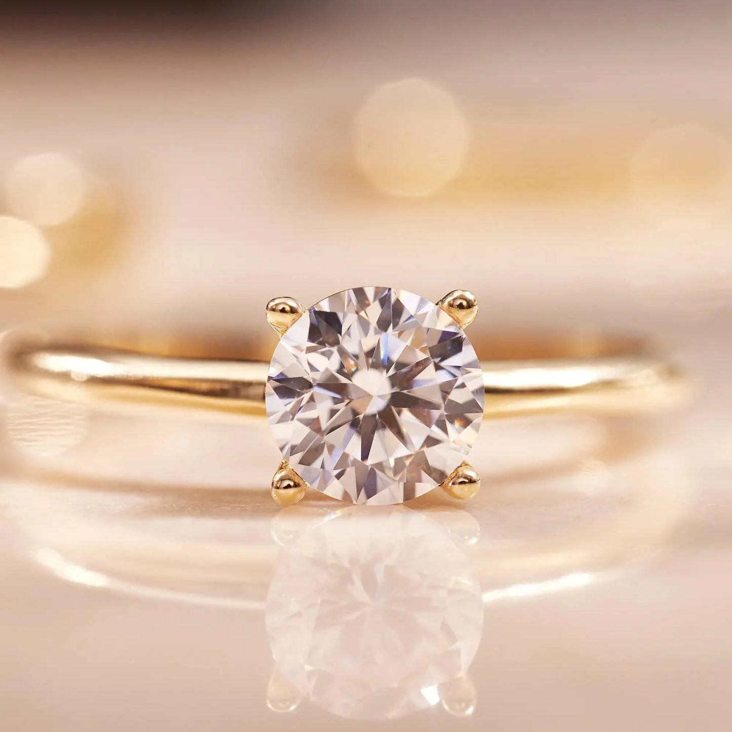 Four Prong Round Cut Moissanite Ring