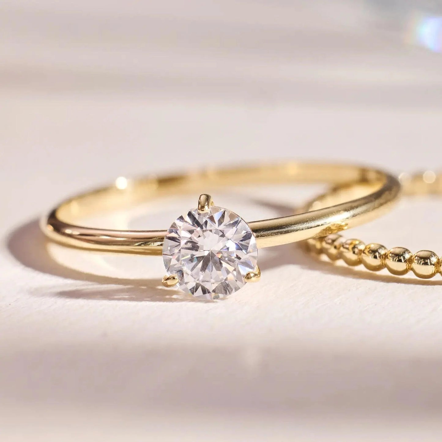 Three Prong Round Cut Moissanite Ring