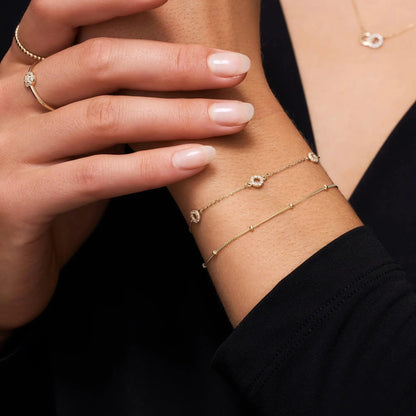 Stationed Pav¨¦ Cubic Zirconia Halo Bracelet